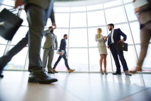 businesspeople-walking-through-office